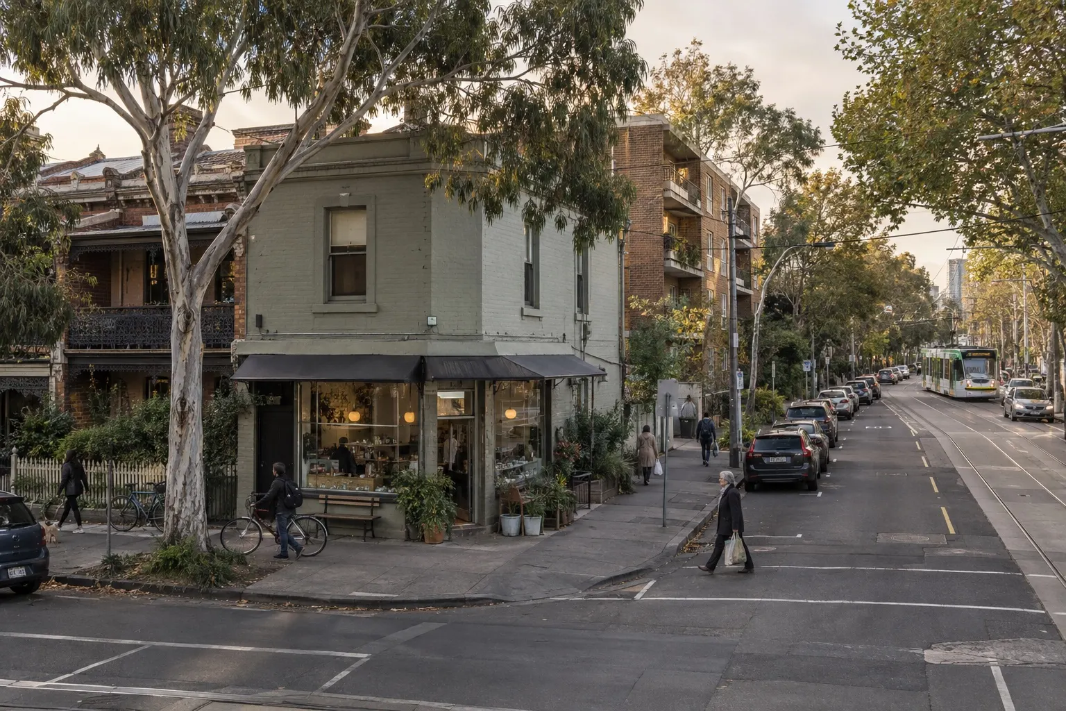 Illustrative Australian neighbourhood with established homes, a corner shop, a tram and people going about their day.